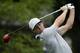 Rory McIlroy, of Northern Ireland, watches his tee shot on the 10th hole during the second round of the PGA Championship golf tournament at Valhalla Golf Club on Friday, Aug. 8, 2014, in Louisville, Ky. (AP Photo/David J. Phillip)