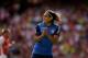 AS Monaco's Radamel Falcao applauds a teammate during the Emirates Cup soccer match between Arsenal and AS Monaco at Arsenal's Emirates Stadium, London, Sunday, Aug. 3, 2014. (AP Photo/Matt Dunham)