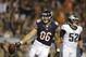 Chicago Bears tight end Zach Miller (86) celebrates after making a touchdown catch against Philadelphia Eagles outside linebacker Jason Phillips (52) in the first half of an NFL preseason football game Friday, Aug. 8, 2014, in Chicago. (AP Photo/Nam Y. Huh)