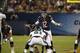 Chicago Bears quarterback David Fales (12) calls a play in the second half of an NFL preseason football game against the Philadelphia Eagles Friday, Aug. 8, 2014, in Chicago. (AP Photo/Charles Rex Arbogast)
