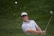 Rory McIlroy, of Northern Ireland, hits out of the bunker on the 12th hole during the second round of the PGA Championship golf tournament at Valhalla Golf Club on Friday, Aug. 8, 2014, in Louisville, Ky. (AP Photo/David J. Phillip)