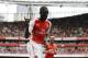 Arsenal's Yaya Sanogo celebrates scoring his fourth goal during the Emirates Cup soccer match between between Arsenal and Benfica at Arsenal's Emirates Stadium in London, Saturday, Aug. 2, 2014. (AP Photo/Matt Dunham)