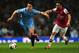 LONDON, ENGLAND - MARCH 29: Samir Nasri of Manchester City and Santi Cazorla of Arsenal battle for the ball during the Barclays Premier League match between Arsenal and Manchester City at Emirates Stadium on March 29, 2014 in London, England. (Photo by Shaun Botterill/Getty Images)