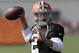 Cleveland Browns quarterback Johnny Manziel passes during practice at the NFL football team's training camp Monday, Aug. 4, 2014, in Berea, Ohio. (AP Photo/Tony Dejak)