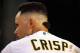 Aug 8, 2014; Oakland, CA, USA; Oakland Athletics DH Coco Crisp (4) waits his turn at bat in the dugout in the fifth inning against the Minnesota Twins at O.co Coliseum. Mandatory Credit: Lance Iversen-USA TODAY Sports
