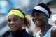 MONTREAL, QC - AUGUST 09: (L-R) Serena Williams of the USA and Venus Williams of the USA pose before their women's semifinals match in the Rogers Cup at Uniprix Stadium on August 9, 2014 in Montreal, Canada. (Photo by Streeter Lecka/Getty Images)