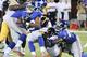 New York Giants running back Rashad Jennings (23) is tackled by Pittsburgh Steelers outside linebacker Jason Worilds (93) in the first quarter of a preseason NFL football game, Saturday, Aug. 9, 2014, in East Rutherford, N.J. (AP Photo/Bill Kostroun)