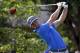 Rory McIlroy, of Northern Ireland, watches his tee shot on the 10th hole during the third round of the PGA Championship golf tournament at Valhalla Golf Club on Saturday, Aug. 9, 2014, in Louisville, Ky. (AP Photo/David J. Phillip)