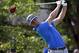 Rory McIlroy, of Northern Ireland, watches his tee shot on the 10th hole during the third round of the PGA Championship golf tournament at Valhalla Golf Club on Saturday, Aug. 9, 2014, in Louisville, Ky. (AP Photo/David J. Phillip)