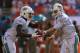 MIAMI GARDENS, FL - SEPTEMBER 22: Ryan Tannehill #17 of the Miami Dolphins hands off to Lamar Miller #26 during a game against the Atlanta Falcons at Sun Life Stadium on September 22, 2013 in Miami Gardens, Florida. (Photo by Mike Ehrmann/Getty Images)