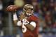 Florida State quarterback Jameis Winston (5) looks to pass against Duke in the first half of the Atlantic Coast Conference Championship NCAA football game in Charlotte, N.C., Saturday, Dec. 7, 2013. (AP Photo/Bob Leverone)