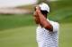 LOUISVILLE, KY - AUGUST 08: Tiger Woods of the United States tips his cap after playing the 18th hole during the second round of the 96th PGA Championship at Valhalla Golf Club on August 8, 2014 in Louisville, Kentucky. (Photo by Sam Greenwood/Getty Images)