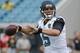 Jacksonville Jaguars quarterback Blake Bortles (5) throws a pass as he warms up prior to the first half of an NFL preseason football game against the Tampa Bay Buccaneers in Jacksonville, Fla., Friday, Aug. 8, 2014. (AP Photo/John Raoux)