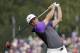Rory McIlroy, of Northern Ireland, watches his tee shot on the fifth hole during the final round of the PGA Championship golf tournament at Valhalla Golf Club on Sunday, Aug. 10, 2014, in Louisville, Ky. (AP Photo/David J. Phillip)