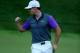 LOUISVILLE, KY - AUGUST 10: Rory McIlroy of Northern Ireland celebrates a putt for birdie on the 17th green during the final round of the 96th PGA Championship at Valhalla Golf Club on August 10, 2014 in Louisville, Kentucky. (Photo by Andy Lyons/Getty Images)