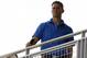 Chicago Cubs President of Baseball Operations, Theo Epstein watches from the tower during spring training baseball practice, Wednesday, Feb. 19, 2014, in Mesa, Ariz. (AP Photo/Rick Scuteri)