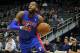 Detroit Pistons forward Greg Monroe (10) drives to the basket in an NBA basketball game against the Atlanta Hawks in Atlanta, Tuesday, April 8, 2014. The Pistons won the game 102-95 (AP Photo/Todd Kirkland)