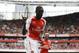 Arsenal's Yaya Sanogo celebrates scoring his fourth goal during the Emirates Cup soccer match between between Arsenal and Benfica at Arsenal's Emirates Stadium in London, Saturday, Aug. 2, 2014. (AP Photo/Matt Dunham)