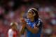 AS Monaco's Radamel Falcao applauds a teammate during the Emirates Cup soccer match between Arsenal and AS Monaco at Arsenal's Emirates Stadium, London, Sunday, Aug. 3, 2014. (AP Photo/Matt Dunham)