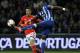FC Porto's Eliaquim Mangala, right, from France clears the ball from Benfica's Rodrigo Machado from Spain, in a Portugal Cup semifinal first leg soccer match at the Dragao stadium in Porto, Portugal, Wednesday, March 26, 2014. (AP Photo/Paulo Duarte)