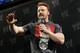 Stephen Farrelly, of Ireland, known as Sheamus, answers a question during a news conference before the WWE Wrestlemania 29 wrestling event, Sunday, April 7, 2013, in East Rutherford, N.J. (AP Photo/Mel Evans)