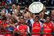 LONDON, ENGLAND - AUGUST 10: (L-R) Alexis Sanchez, Alex Oxlade-Chamberlain, Mikel Arteta and Tomas Rosicky of Arsenal celebrate with the trophy after the FA Community Shield match between Manchester City and Arsenal at Wembley Stadium on August 10, 2014 in London, England. (Photo by Clive Mason/Getty Images)