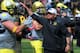 EUGENE, OR - MAY 3: Oregon Ducks head coach Mark Helfrich greets his players before the Spring game at Autzen Stadium on May 3, 2014 in Eugene, Oregon. (Photo by Steve Dykes/Getty Images)