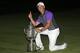Rory McIlroy, of Northern Ireland, holds up the Wanamaker Trophy after winning the PGA Championship golf tournament at Valhalla Golf Club on Sunday, Aug. 10, 2014, in Louisville, Ky. (AP Photo/Mike Groll)