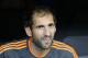 Real's goalkeeper Diego Lopez looks out from the bench before the start of a Group B Champions League soccer match between Real Madrid and Juventus at the Santiago Bernabeu stadium in Madrid, Spain, Wednesday Oct. 23, 2013. (AP Photo/Paul White)
