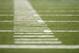 Hash marks on the turf during a preseason NFL football game between the Detroit Lions and the Cleveland Browns at Ford Field in Detroit, Saturday, Aug. 9, 2014. (AP Photo/Rick Osentoski)