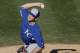 Kansas City Royals starting pitcher Jason Adam pitches to an Arizona Diamondbacks batter during the eighth inning of an exhibition spring training baseball game Wednesday, March 5, 2014, in Scottsdale, Ariz. (AP Photo/Gregory Bull)