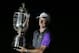 Rory McIlroy, of Northern Ireland, holds up the Wanamaker Trophy after winning the PGA Championship golf tournament at Valhalla Golf Club on Sunday, Aug. 10, 2014, in Louisville, Ky. (AP Photo/David J. Phillip)