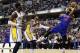 Dec 16, 2013; Indianapolis, IN, USA; Detroit Pistons center Greg Monroe (10) saves the ball from going out of bounds while guarded by Indiana Pacers center Roy Hibbert (55) and forward Paul George (24) at Bankers Life Fieldhouse. Mandatory Credit: Brian Spurlock-USA TODAY Sports