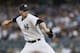 New York Yankees starting pitcher Brandon McCarthy delivers in the first inning of a baseball game against the Detroit Tigers at Yankee Stadium in New York, Tuesday, Aug. 5, 2014. (AP Photo/Kathy Willens)