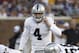 Oakland Raiders quarterback Derek Carr (4) audibles against the Minnesota Vikings in the first half of a preseason NFL football game at TCF Bank Stadium in Minneapolis, Friday, Aug. 8, 2014. (AP Photo/Ann Heisenfelt)