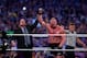 Paul Heyman, left, celebrates with Brock Lesnar after his win over the Undertaker during Wrestlemania XXX at the Mercedes-Benz Super Dome in New Orleans on Sunday, April 6, 2014. (Jonathan Bachman/AP Images for WWE)