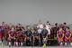 Bayern Munich players wait for the start of an official photo shooting for the new German first division Bundesliga season in Munich, southern Germany, Saturday, Aug. 9, 2014. (AP Photo/Matthias Schrader)