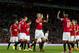 Manchester United's Darren Fletcher, centre, celebrates with teammates after scoring against Valencia, during a pre season friendly soccer match at Old Trafford Stadium, Manchester, England, Tuesday Aug. 12, 2014. (AP Photo/Jon Super)