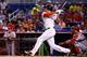 MIAMI, FL - AUGUST 11: Giancarlo Stanton #27 of the Miami Marlins hits a home run during the first inning of the game against the St. Louis Cardinals at Marlins Park on August 11, 2014 in Miami, Florida. (Photo by Rob Foldy/Getty Images)