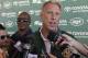 Jets general manager John Idzik responds to questions during a news interview after practice during NFL football training camp Friday, July 25, 2014, in Cortland, N.Y. (AP Photo)