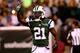 EAST RUTHERFORD, NJ - AUGUST 07: Running back Chris Johnson #21 of the New York Jets celebrates a touchdown against the Indianapolis Colts in the second quarter during a preseason game at MetLife Stadium on August 7, 2014 in East Rutherford, New Jersey. (Photo by Elsa/Getty Images)