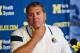 Michigan head coach Brady Hoke reacts to reporters' questions during a press conference at the NCAA college football team's preseason media day, Sunday, Aug. 10, 2014, in Ann Arbor, Mich. (AP Photo/Tony Ding)