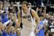 Dallas Mavericks' Dirk Nowitzki (41) of Germany celebrates sinking a three-point basket against the San Antonio Spurs in the second half of Game 4 of an NBA basketball first-round playoff series, Monday, April 28, 2014, in Dallas. The Spurs won 93-89. (AP Photo/Tony Gutierrez)