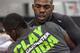 ALBUQUERQUE, NM - APRIL 2: UFC lightweight champion Jon 'Bones' Jones joins in for a warm up during an open training session for fans and media at the Jackson's Mixed Martial Arts and Fitness on April 2, 2014 in Albuquerque, New Mexico. (Photo by Aaron Sweet/Getty Images)