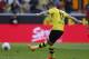Dortmund's Marco Reus scores by penalty during the German first division Bundesliga soccer match between BvB Borussia Dortmund and Mainz 05 in Dortmund, Germany, Saturday, April 19, 2014. (AP Photo/Frank Augstein)
