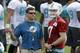 Miami Dolphins assistant coach Bill Lazor, left, talks to quarterback Ryan Tannehill during NFL football training camp Saturday, July 26, 2014, in Davie, Fla. (AP Photo/Alan Diaz)