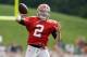 Cleveland Browns quarterback Johnny Manziel passes during practice at NFL football training camp in Berea, Ohio Tuesday, Aug. 12, 2014. (AP Photo/Mark Duncan)