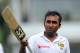 Sri Lankan cricketer Mahela Jayawardene celebrates his century during the first day of the second test cricket match between Sri Lanka and South Africa in Colombo, Sri Lanka, Thursday, July 24, 2014. (AP Photo/Sanka Gayashan)
