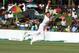 South African bowler Dale Steyn dives for the ball during the Test match against Zimbabwe at Harare Sports club, Saturday, Aug. 9, 2014. Zimbabwe won the toss and elected to bat on the first day of the one off test against South Africa in Harare. (AP Photo/Tsvangirayi Mukwazhi)