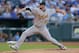 KANSAS CITY, MO - AUGUST 12: Jon Lester #31 of the Oakland Athletics throws in the first inning against the Kansas City Royals at Kauffman Stadium on August 12, 2014 in Kansas City, Missouri. (Photo by Ed Zurga/Getty Images)